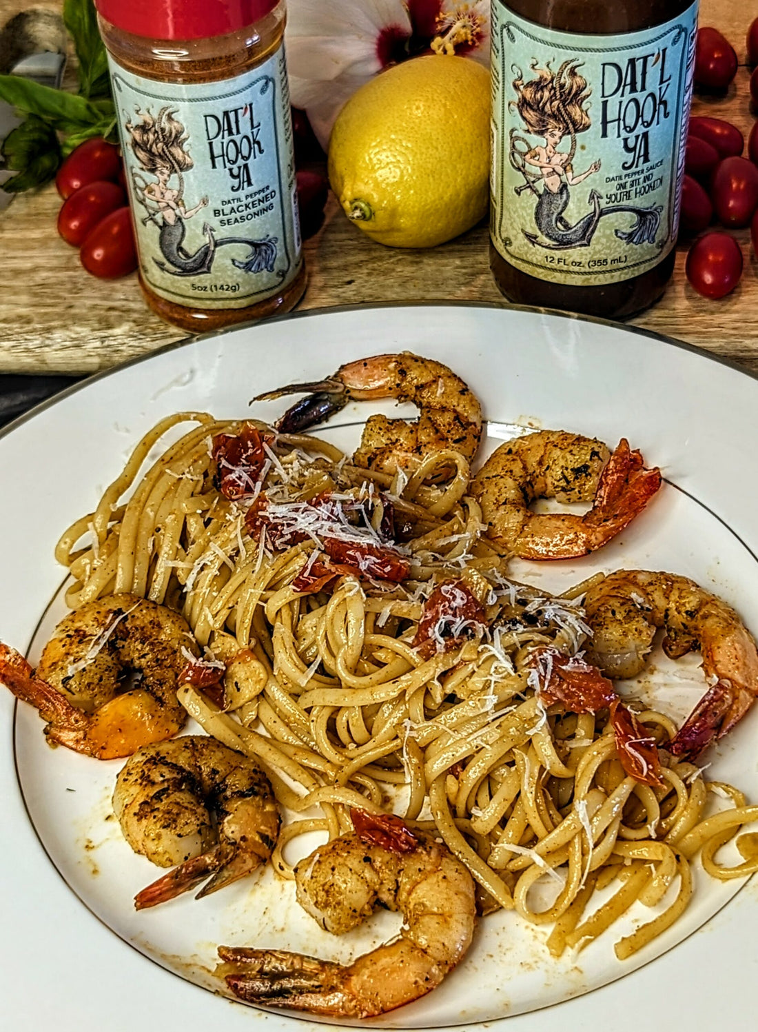 Dat’l Hook Ya Blackened Shrimp with a Basil Lemon White Wine sauce over pasta